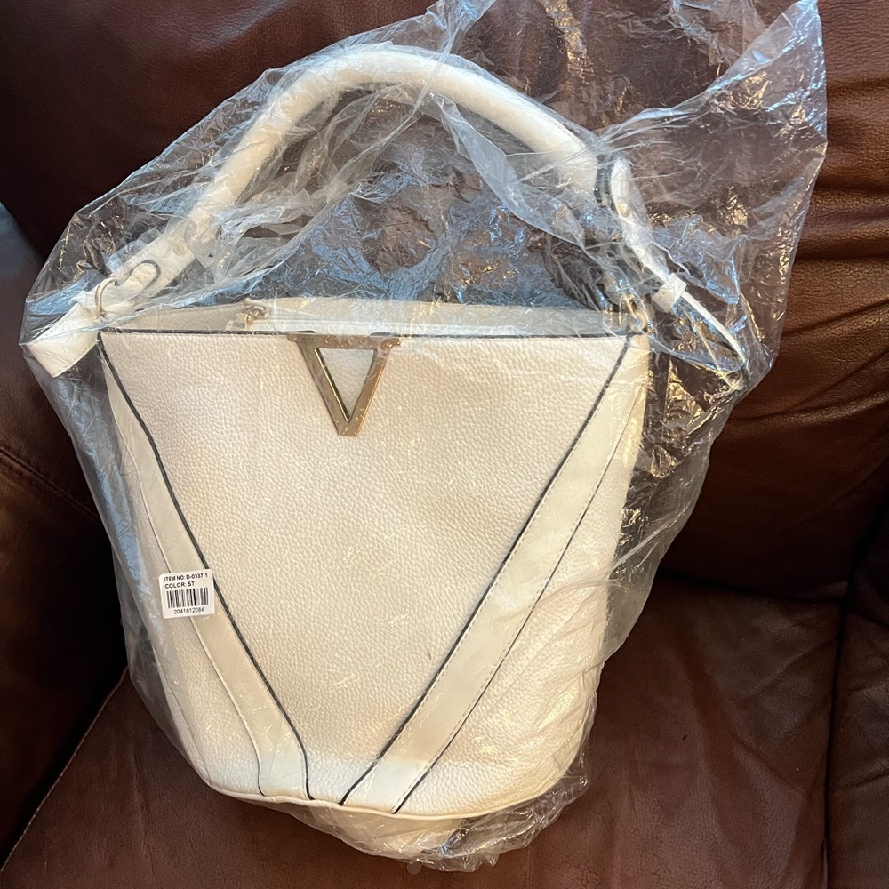 White bag with shoulder strap
